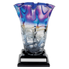 Multi-colored vase on a base.