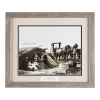 A family next to their dugout house in Oklahoma Territory.